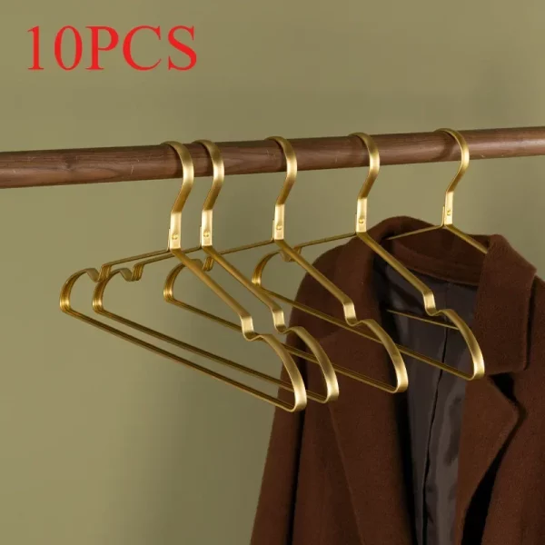Lot de 10 cintres alu dorés élégants