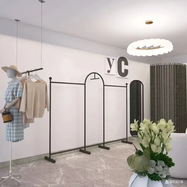 Grand portant vêtement design arc pour boutique